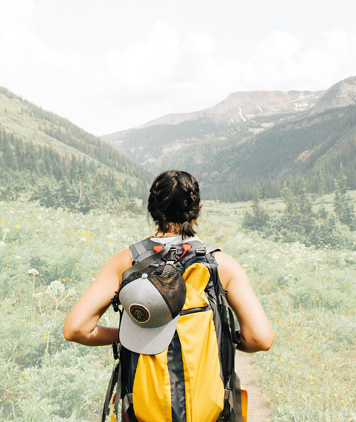 backpacking woman in a valley
